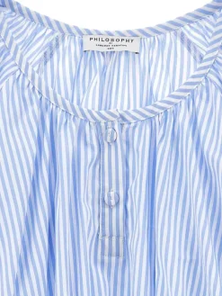 Blusa a strisce blu e bianche