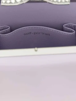 Borsetta mini con fiocco in pelle lilla
