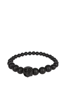 Bracciale in resina con perline e teschio