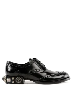 Brogue con tacco borchiato