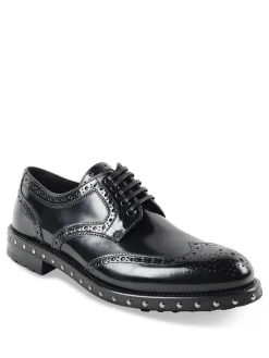 Brogue in pelle con borchiette