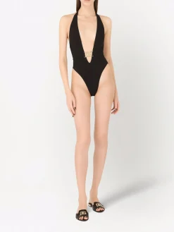Costume con scollo profondo e cintura nera