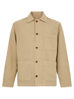 Giacca beige in cotone con bottoni e tasche