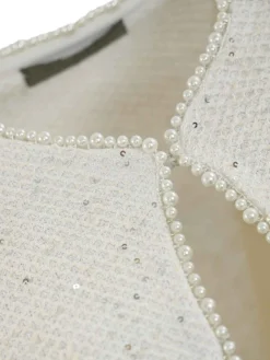 Giacca boucle con cristalli e perle