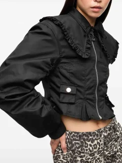 Giacca nera con tasca con zip manica