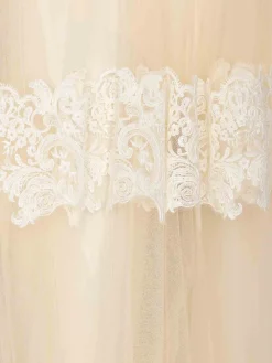 Gonna di tulle con decorazioni in pizzo