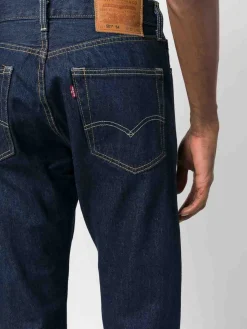 Jeans a gamba a gamba a ginnastica scura