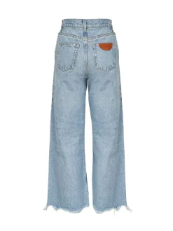 Jeans in denim ritagliati