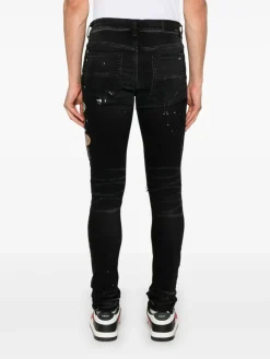 Jeans magri con patch