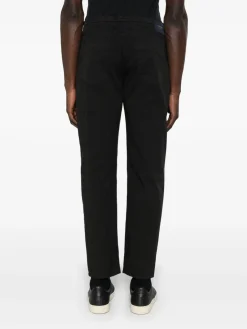 Pantaloni a gamba affusolata tratto nero