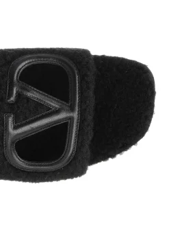 Pantofole di diapositive pelose