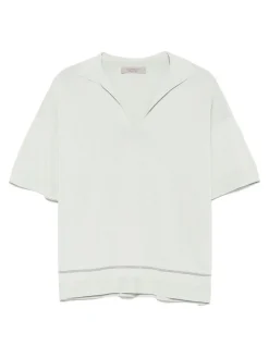 Polo verde chiaro con fessure laterali corte