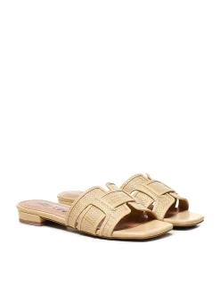 Sandali piatti di agrifoglio