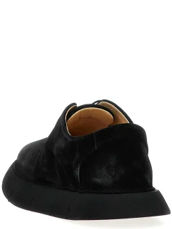Scarpe intagliata derby