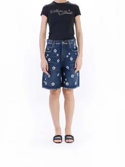 Short gamba larga Daisy di paillettes