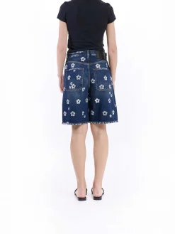 Short gamba larga Daisy di paillettes