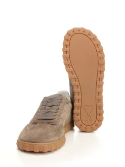 Sneaker a bassa pizzo in pelle divisa
