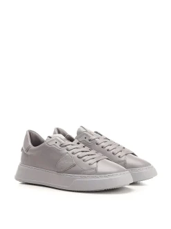 Sneaker grigie a bassa cima