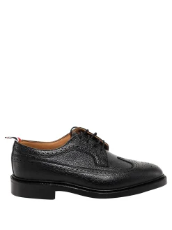 Stringate in pelle martellata