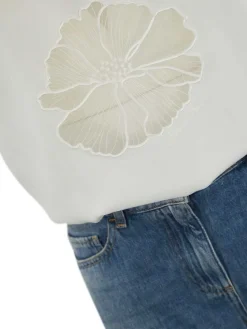 Trompe-Loeil salta in denim e crepe