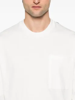 T-shirt in maglia bianco a maniche lunghe